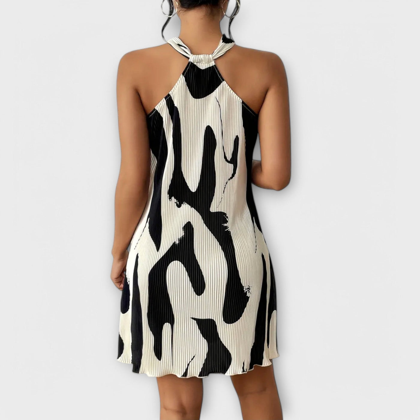 ZUZANA | Elegantní halter šaty s potiskem a A-liniovým designem